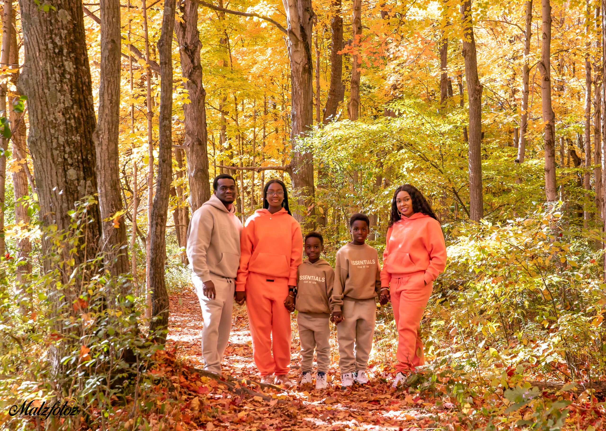 Family having a fall themed photoshoot